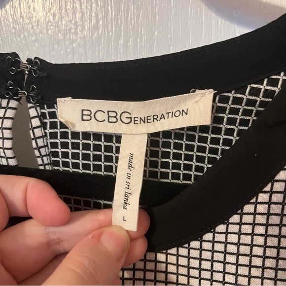 BCBGeneration Black and White Peplum Top - Picture 3 of 7